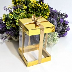 Cutie din plastic transparent cu capac din carton auriu si funda 15cm x 10cm x 10cm